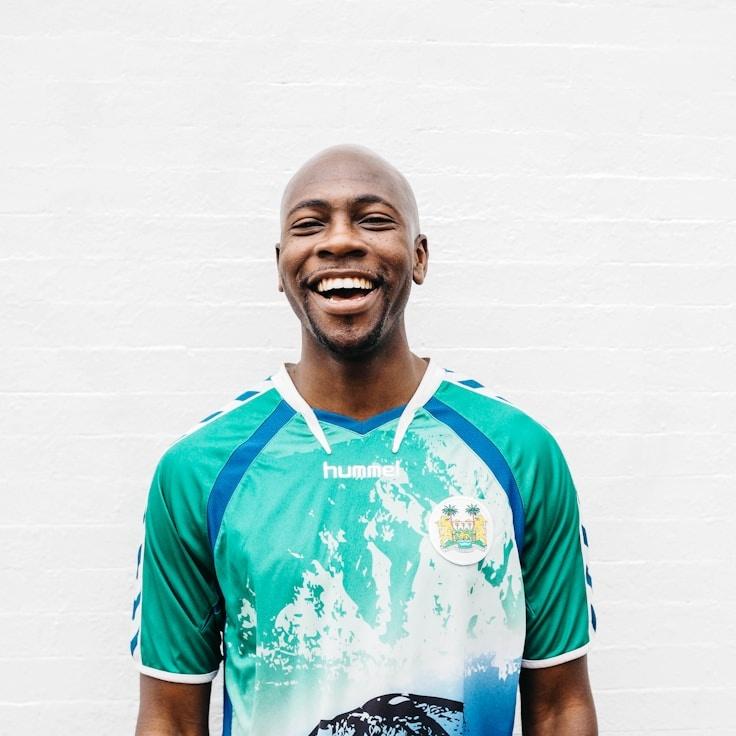 Kaveri Mehta, Lead Design Curator at Prairie Candle Harbor, reviewing corporate floral arrangements